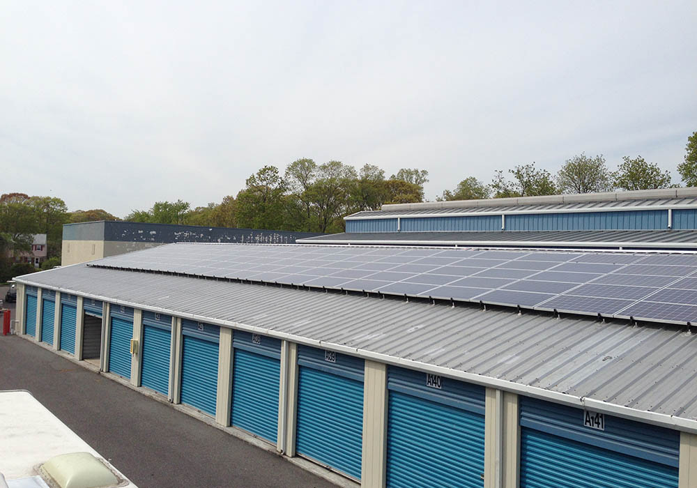 Roof-mounted solar panels on a commercial business building